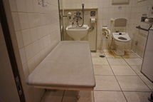 Restrooms equipped with ostomate facility and folding bed 